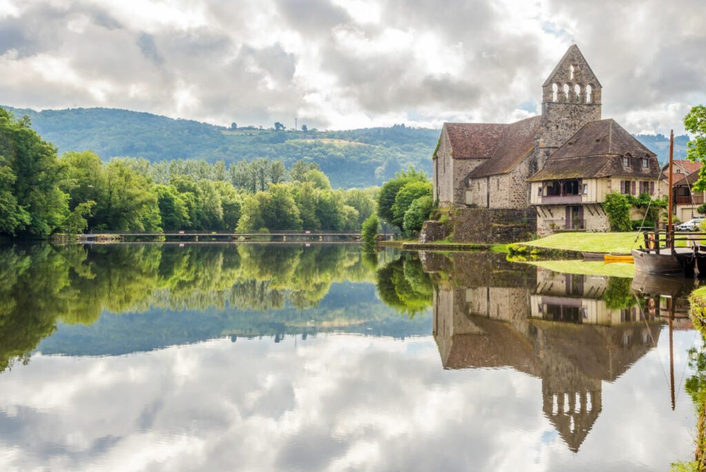 View at the Old Chapel on the Bank of Dordogne river in Beaulieu-sur-Dordogne ,France