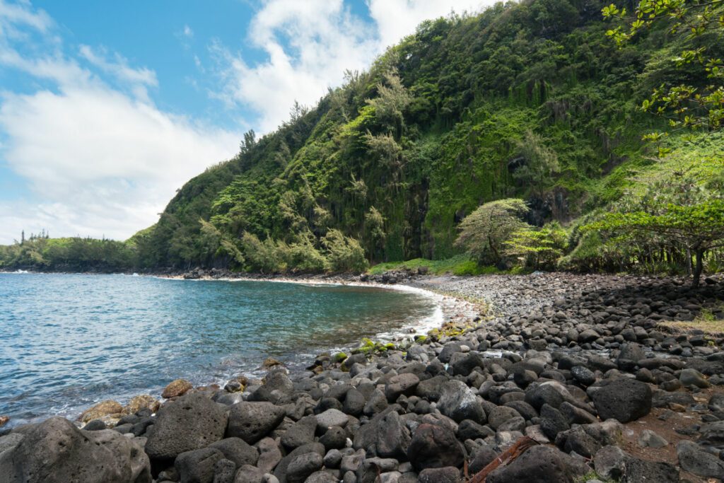 Sunny day at beautiful tropical lava stone beach at Anse de Cascades, La Reunion in autumn