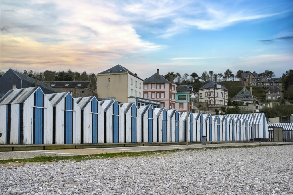 Yport, wooden beach cabins in Normandy, on the pebble beach